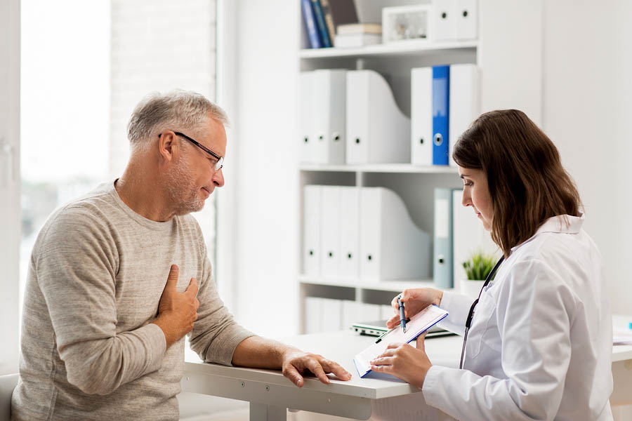 Doctor Discussing Atrial Fibrillation with patient